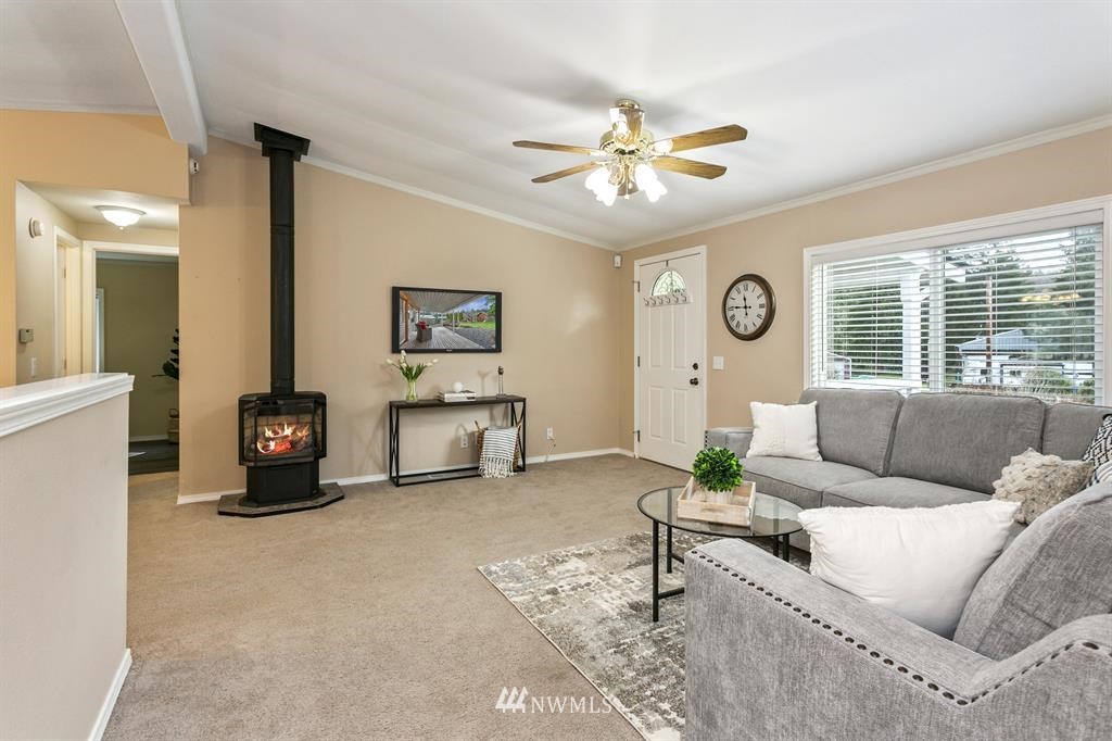 520 North Carpenter Road Snohomish, WA 98290 - Photo 6 of 25 a living room with furniture and a large window