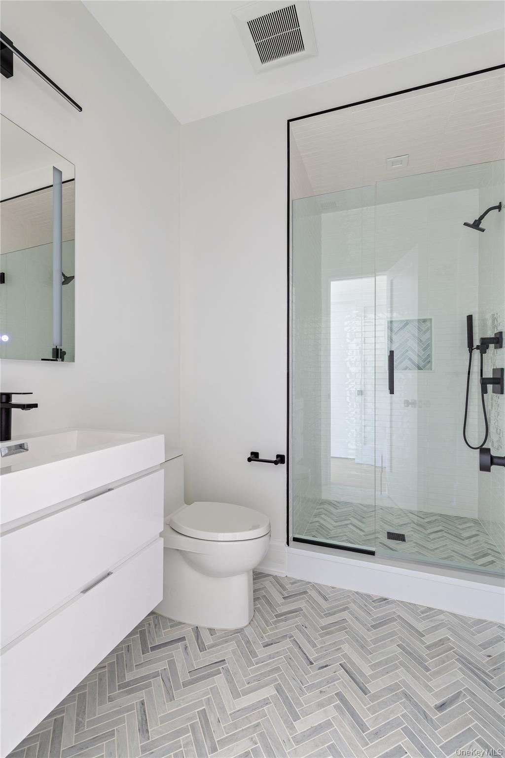42 Mamaroneck Road Scarsdale, NY 10583 - Photo 37 of 47 Each secondary bedroom enjoys the comfort and privacy of its own thoughtfully designed ensuite bathroom with premium contemporary finishes.