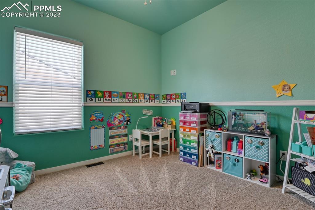 9785 Terrain Road Fountain, CO 80817 - Photo 24 of 40 a room with toys and a window