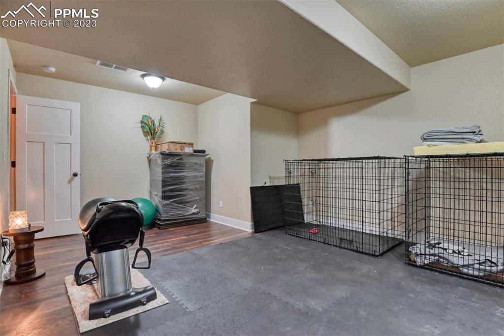 9785 Terrain Road Fountain, CO 80817 - Photo 35 of 40 a view of a livingroom with furniture and gym equipment