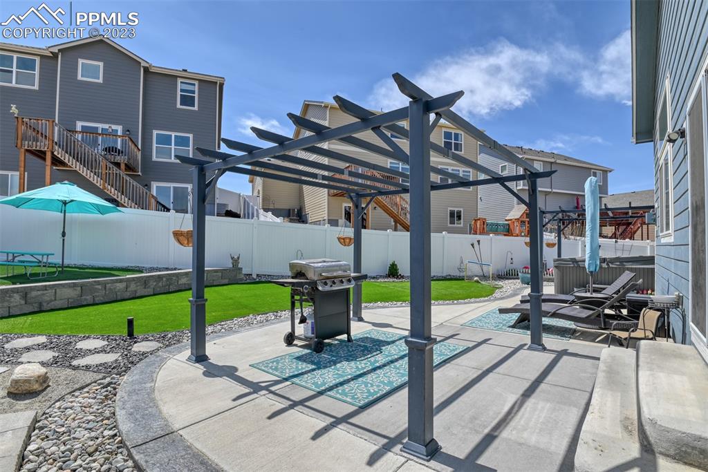 9785 Terrain Road Fountain, CO 80817 - Photo 36 of 40 a view of a chairs and table in the patio