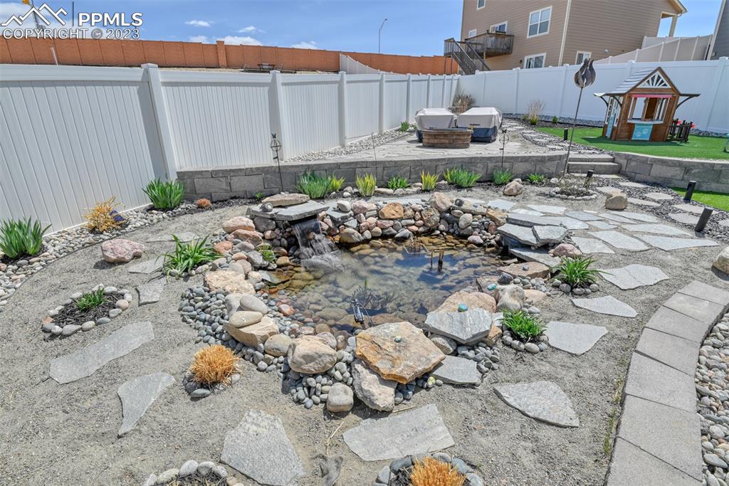 9785 Terrain Road Fountain, CO 80817 - Photo 38 of 40 a garden view with a seating space