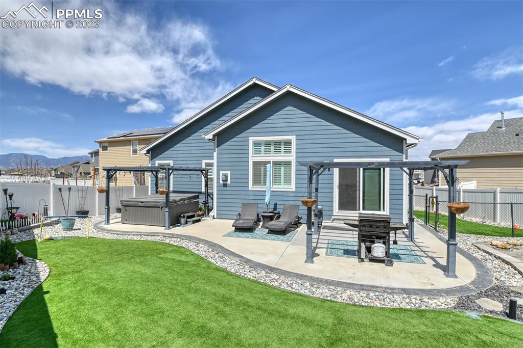 9785 Terrain Road Fountain, CO 80817 - Photo 40 of 40 a house view with a sitting space and garden