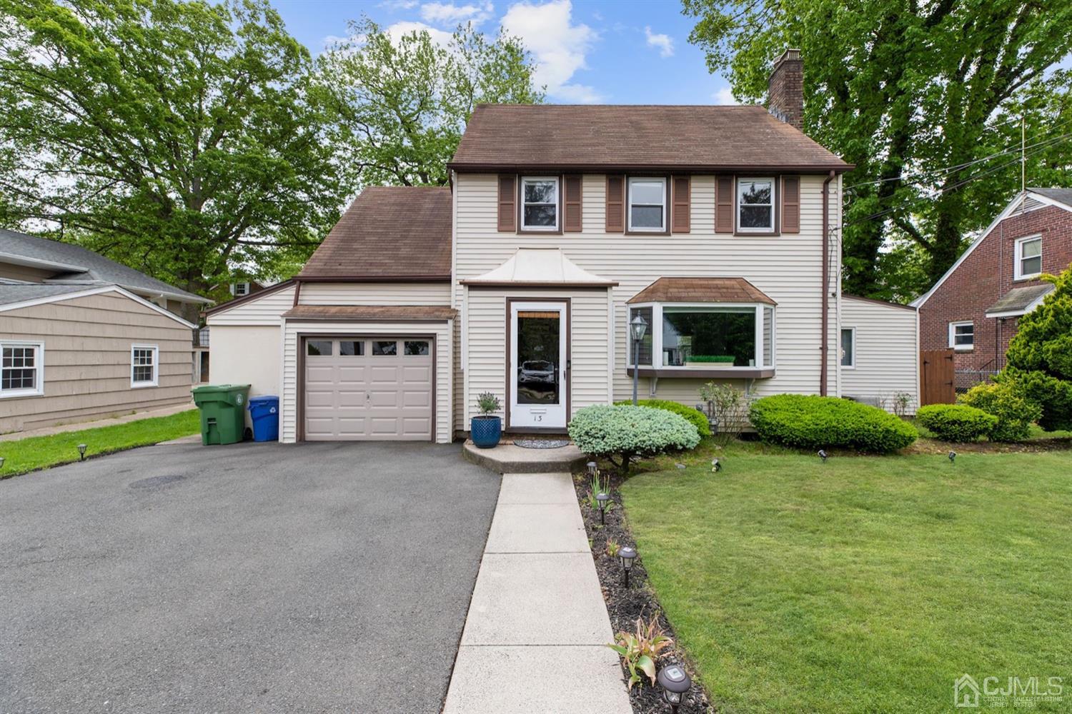 13 Edgewood Road Linden, NJ 07036 - Photo 1 of 14 a front view of a house with yard