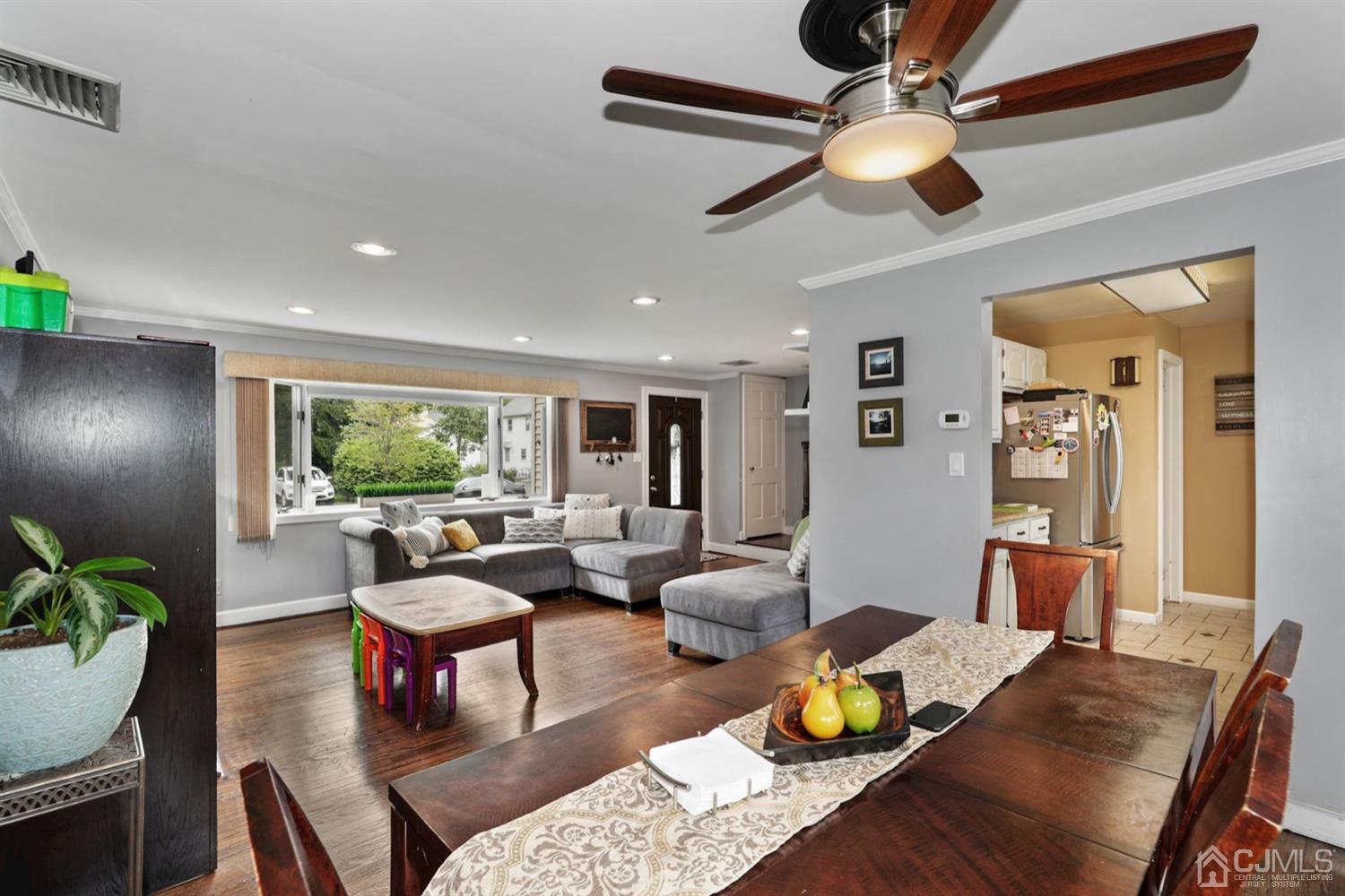 13 Edgewood Road Linden, NJ 07036 - Photo 5 of 14 a living room with furniture and a large window