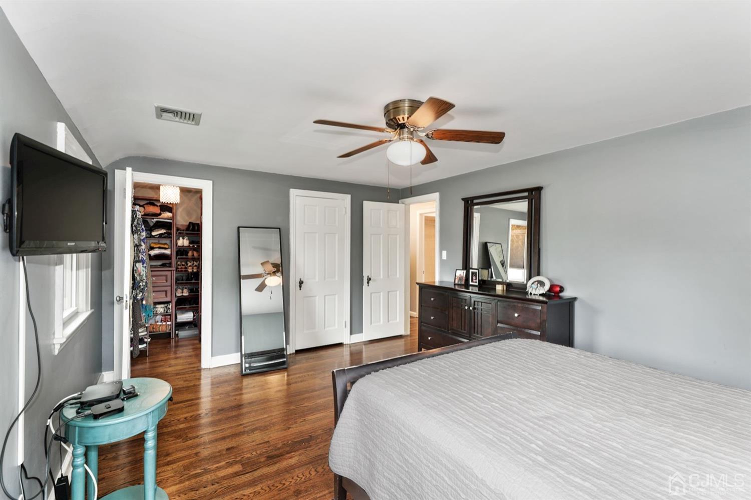 13 Edgewood Road Linden, NJ 07036 - Photo 10 of 14 a bedroom with a bed and a flat screen tv