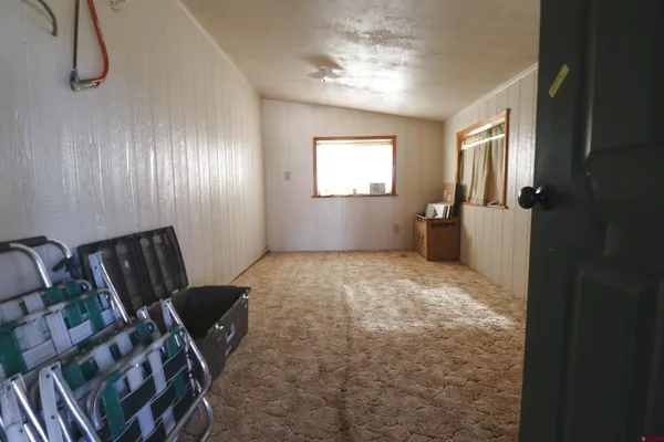 a view of empty room with windows