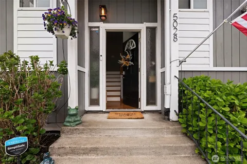 a view of a pathway of the house front of house