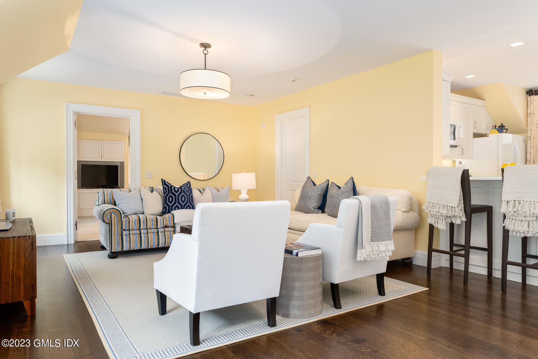 50 Dingletown Road Greenwich, CT 06830 - Photo 25 of 35 a living room with furniture wooden floor and a chandelier