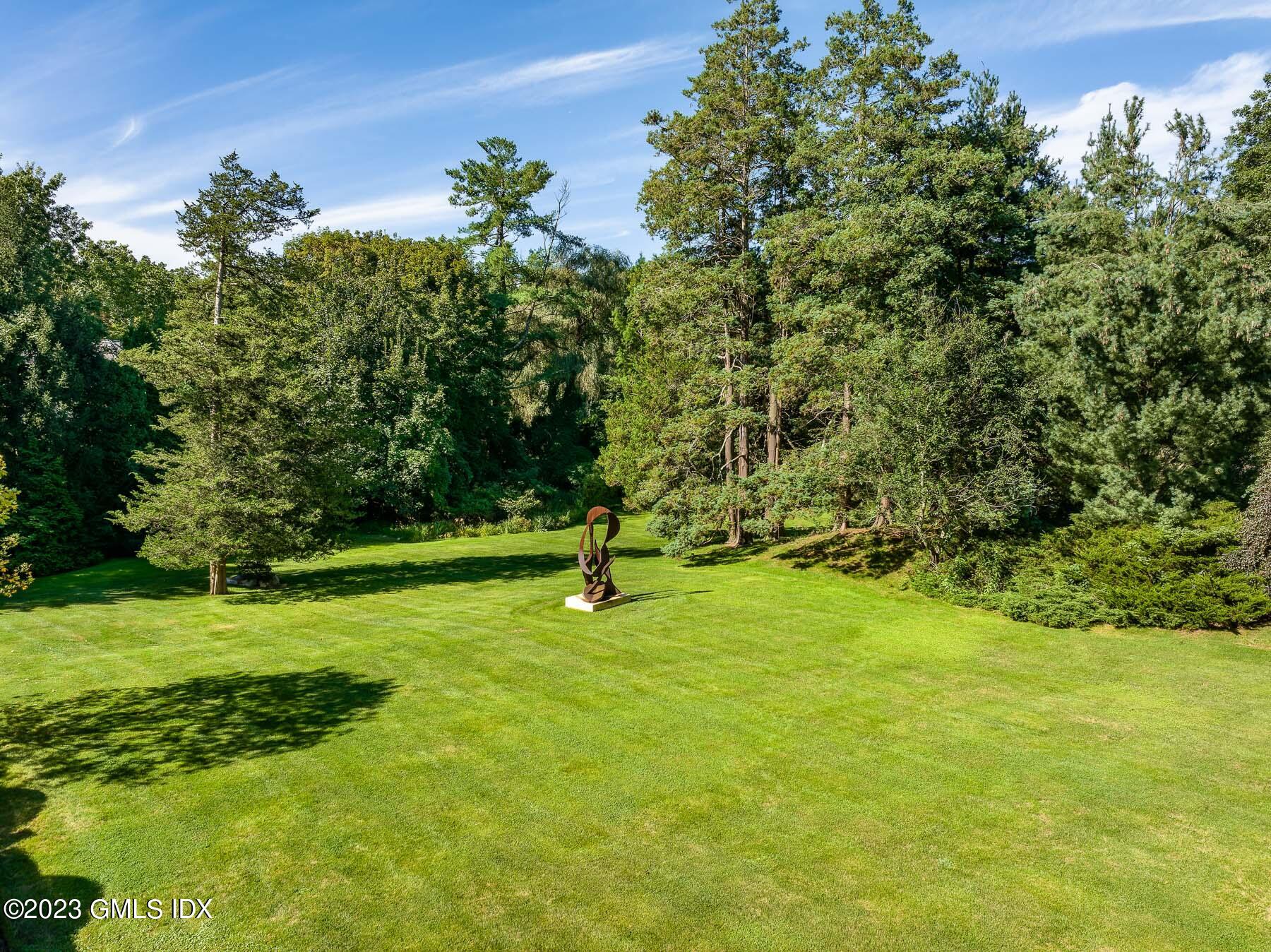 50 Dingletown Road Greenwich, CT 06830 - Photo 33 of 35 a view of a tree in a yard