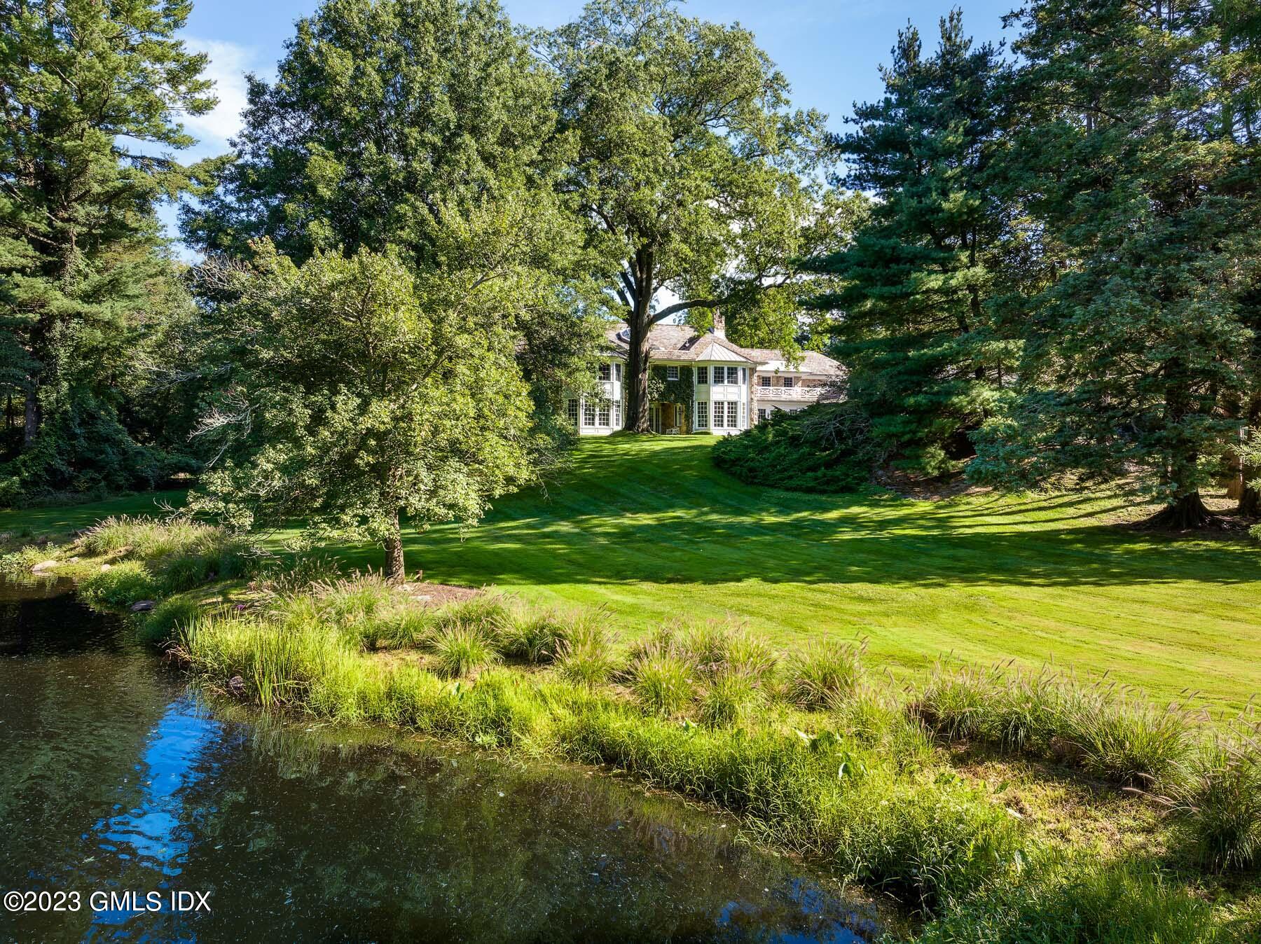 50 Dingletown Road Greenwich, CT 06830 - Photo 34 of 35 a view of a garden with trees