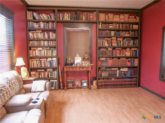 a bathroom with a sink mirror toilet and shower