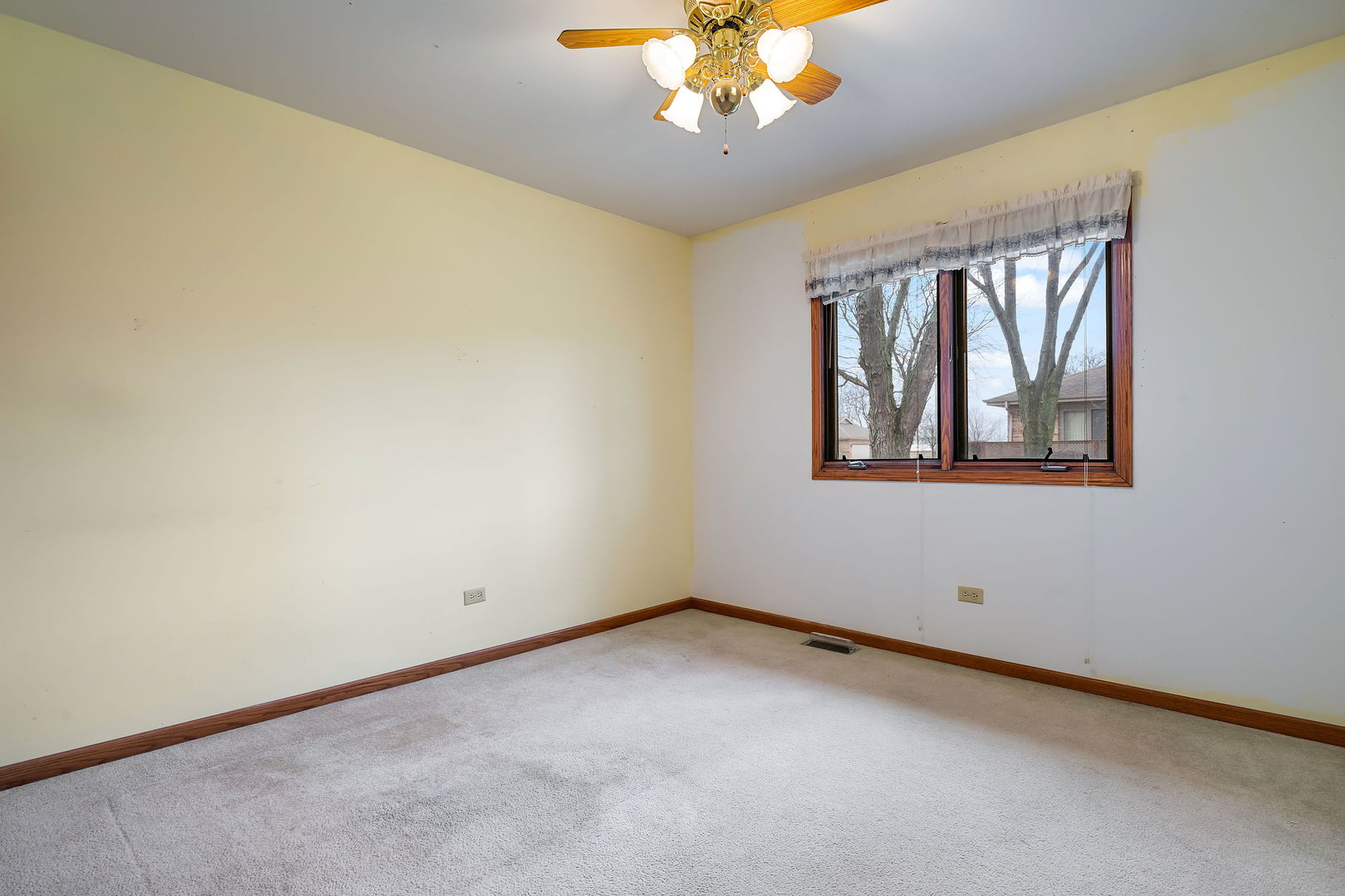 801 Eagle Creek Road Elwood, IL 60421 - Photo 9 of 17 a view of an empty room with a window