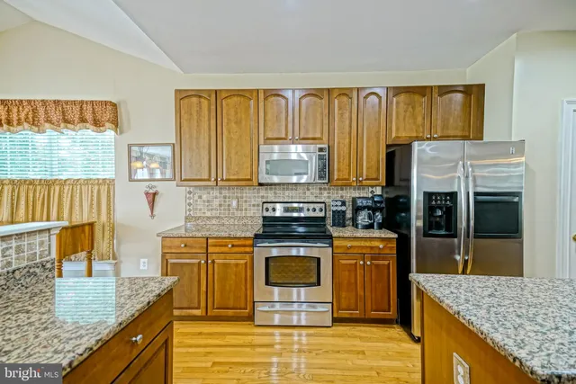 a living room with furniture fireplace and flat screen tv