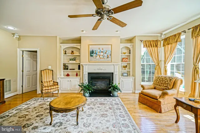 a balcony with furniture and a potted plant