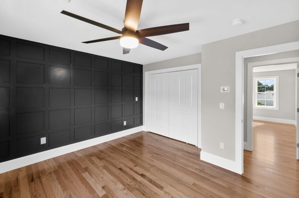 3 Morses Lane Acushnet, MA 02743 - Photo 33 of 42 a view of an empty room with wooden floor