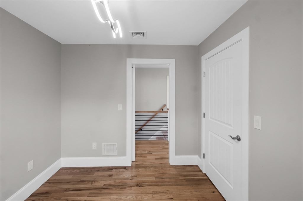 3 Morses Lane Acushnet, MA 02743 - Photo 35 of 42 a view of room with wooden floor