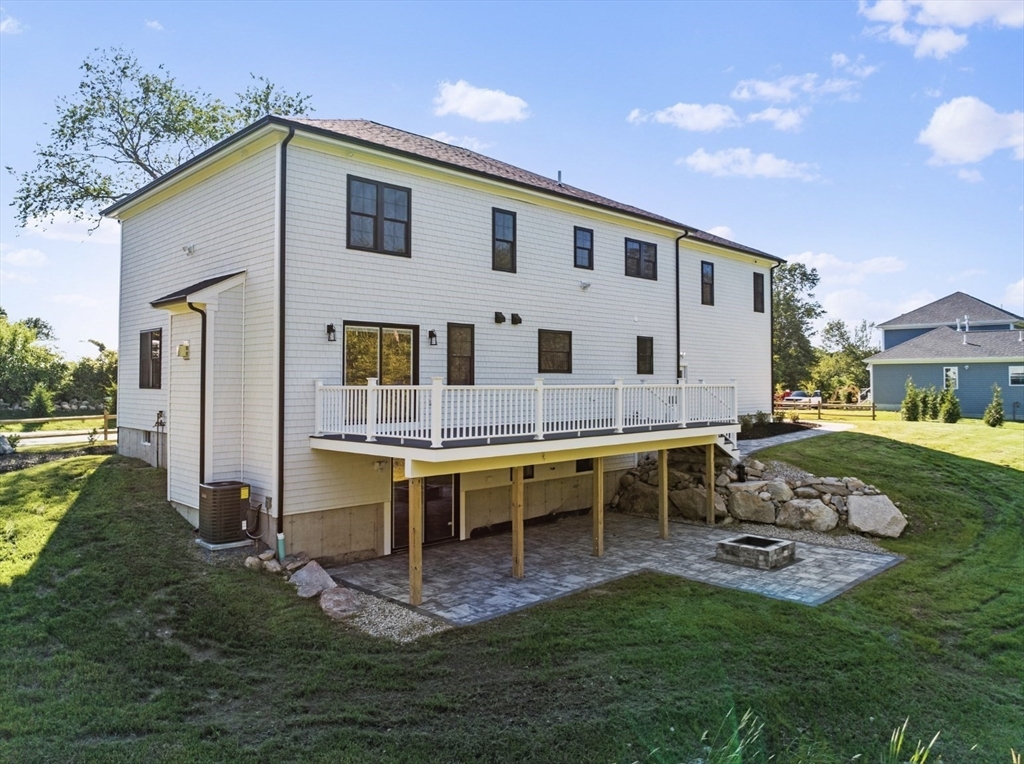 3 Morses Lane Acushnet, MA 02743 - Photo 5 of 42 a swimming pool with outdoor seating and yard