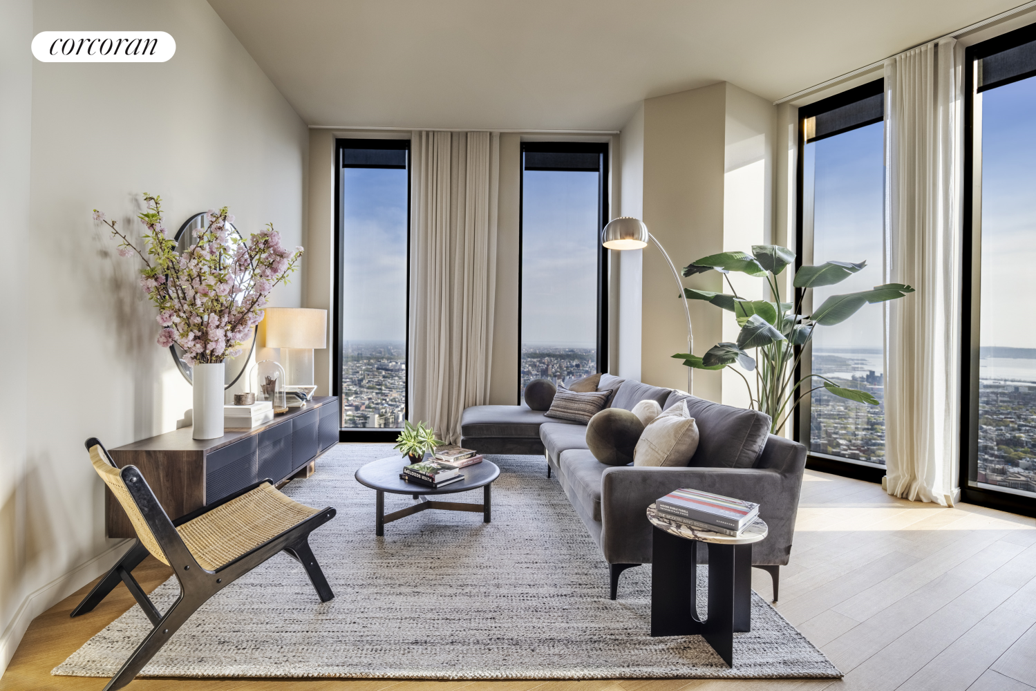 85 Fleet Street, Unit 79D Brooklyn, NY 11201 - Photo 2 of 19 a living room with furniture and a potted plant