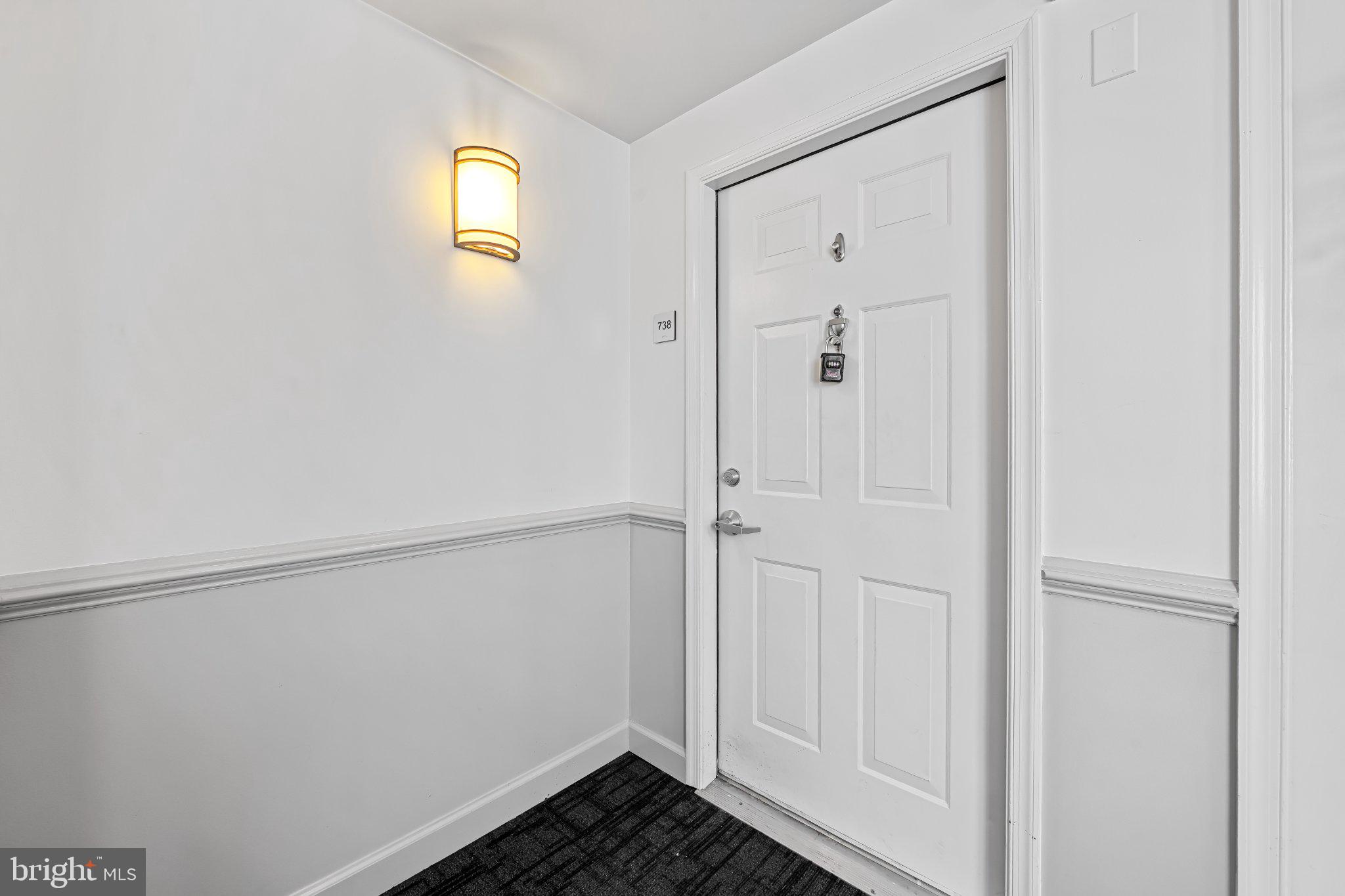 2702 Lighthouse Point East, Unit 738 Baltimore, MD 21224 - Photo 4 of 33 Inviting entryway with modern charm.