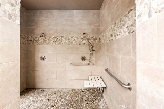 a bedroom with furniture and a fireplace