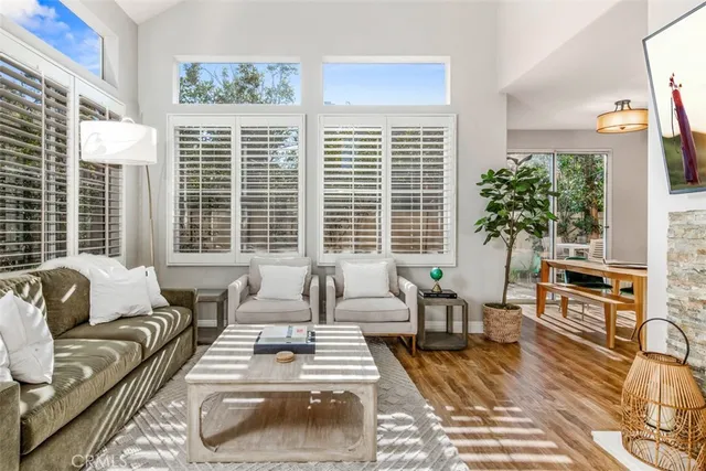 a kitchen with a sink a counter top space and cabinets