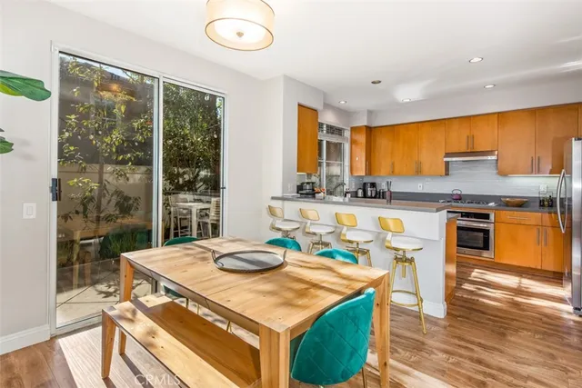 a kitchen with granite countertop a sink and a window