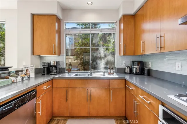 a view of a hallway with paintings on the wall