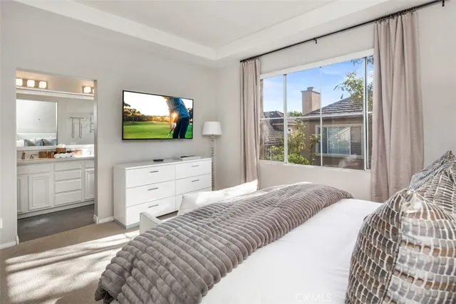 a view of a patio with table and chairs with wooden floor and fence