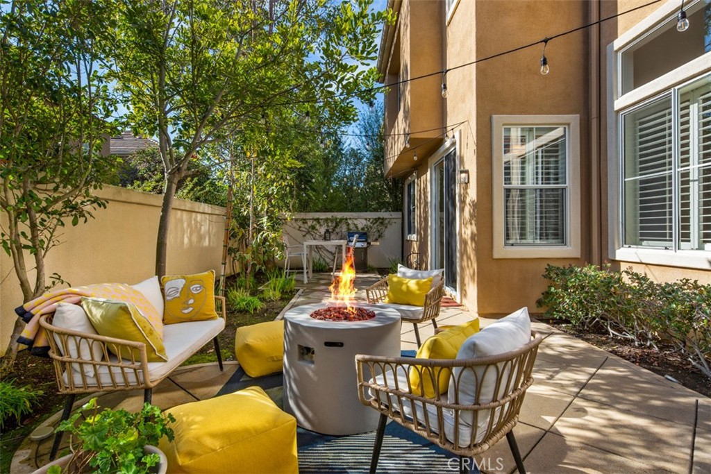 110 Lessay Newport Coast, CA 92657 - Photo 48 of 51 a backyard of a house with table and chairs