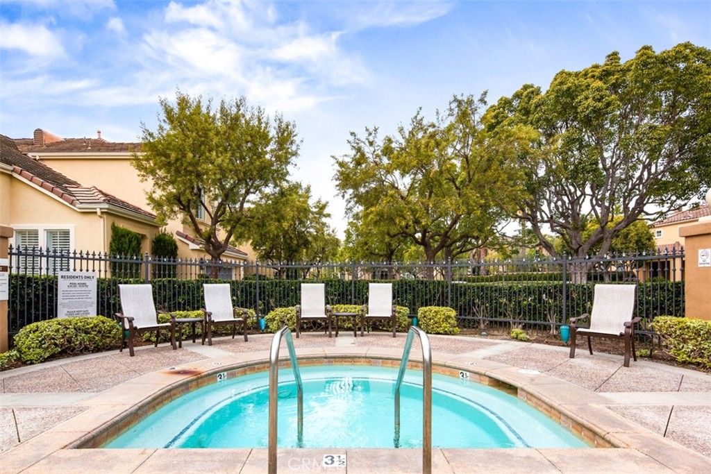 110 Lessay Newport Coast, CA 92657 - Photo 9 of 51 a view of a patio with a table and chairs