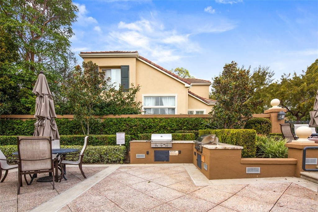 110 Lessay Newport Coast, CA 92657 - Photo 10 of 51 a view of a patio with a chairs