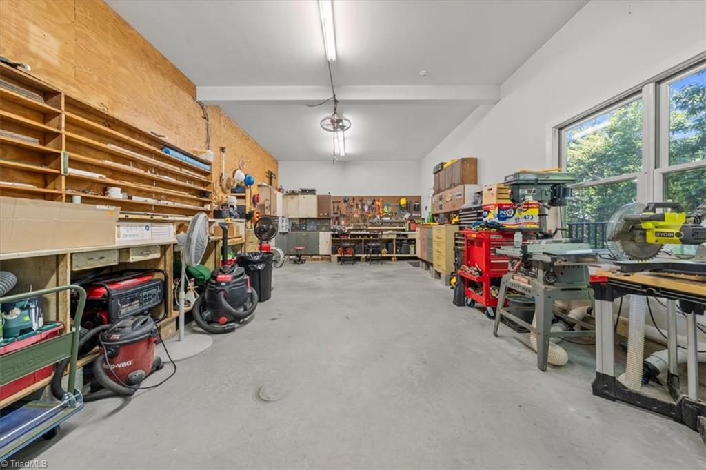 2207 Sierra Trace Road Denton, NC 27239 - Photo 37 of 49 Impressive workshop area with abundant storage, workspace, and room for hobbies or projects
