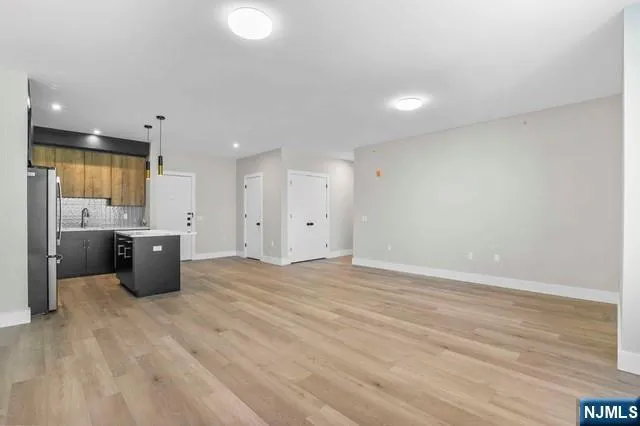 a view of a kitchen with a sink