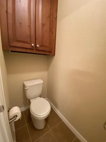 a bathroom with a toilet