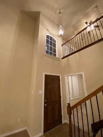 a stove top oven sitting inside of a kitchen