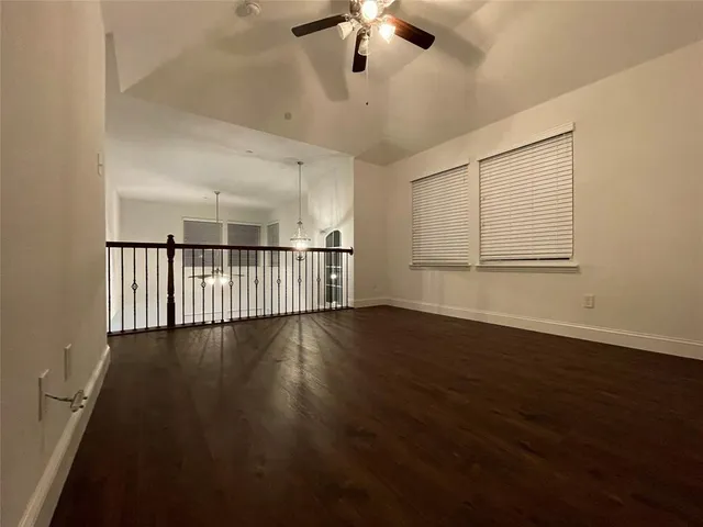 a kitchen with granite countertop a stove and a microwave