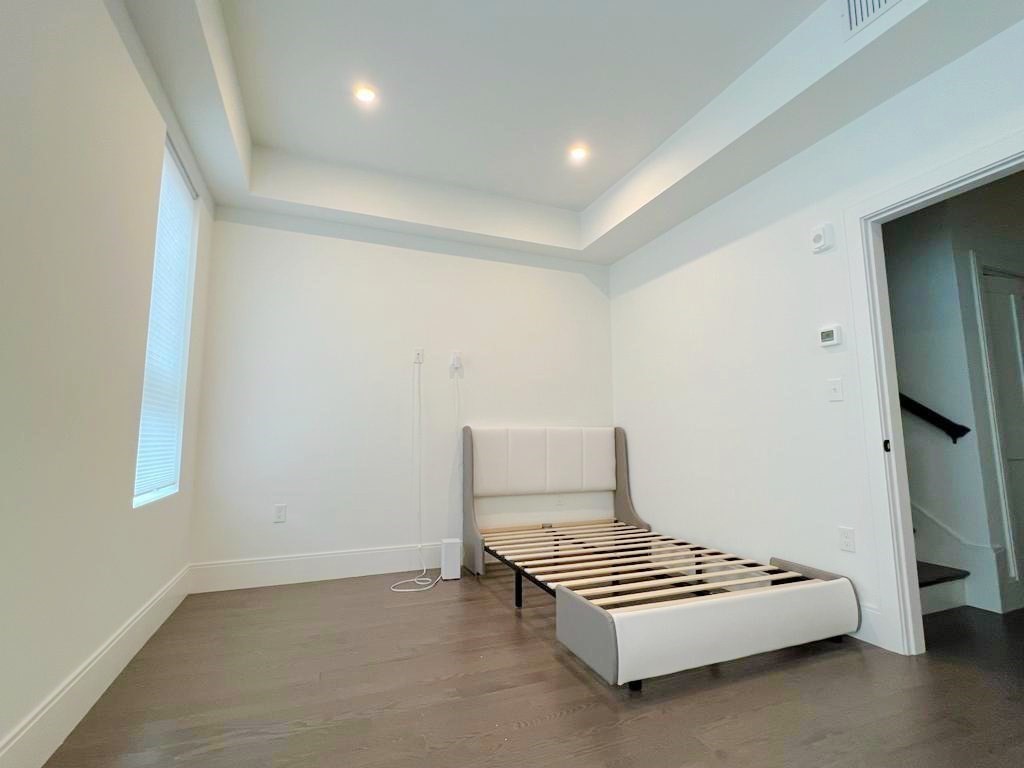 23 Charles Park Road, Unit 23 Boston, MA 02132 - Photo 18 of 35 a living room with furniture