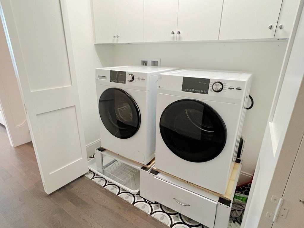 23 Charles Park Road, Unit 23 Boston, MA 02132 - Photo 20 of 35 a utility room with dryer and washer