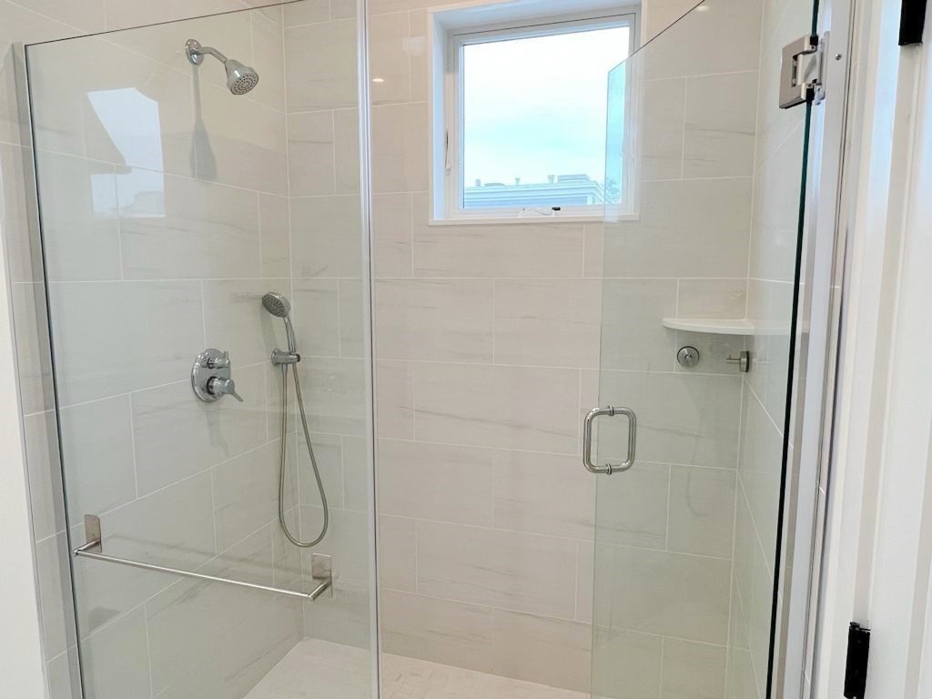 23 Charles Park Road, Unit 23 Boston, MA 02132 - Photo 29 of 35 a bathroom with a shower