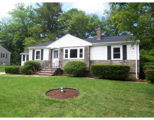 52 Farnham Road Stoughton, MA 02072 - Photo 1 of 1 a front view of a house with a yard