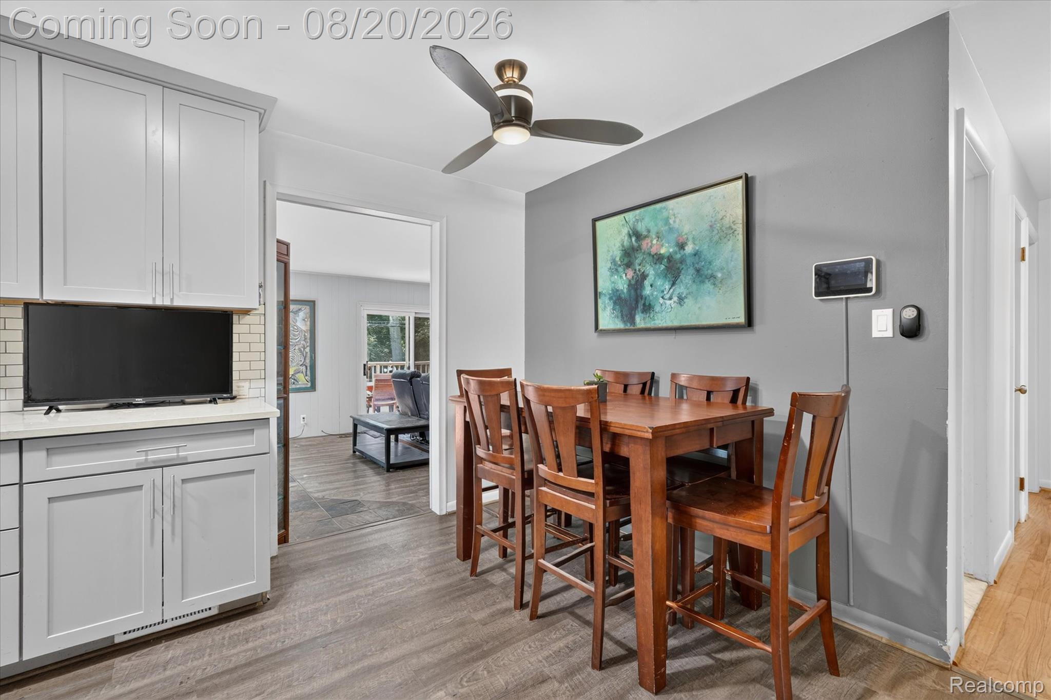 6235 Waldon Road Clarkston, MI 48346 - Photo 10 of 41 Wood-finish flooring throughout, complemented by a contemporary ceiling fan