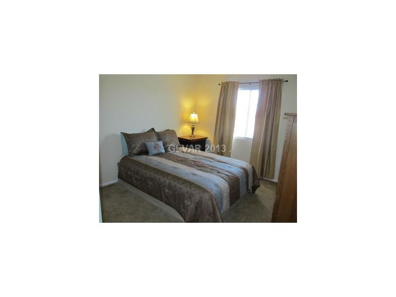 10594 Cave Ridge Street Las Vegas, NV 89179 - Photo 16 of 21 Bedroom.