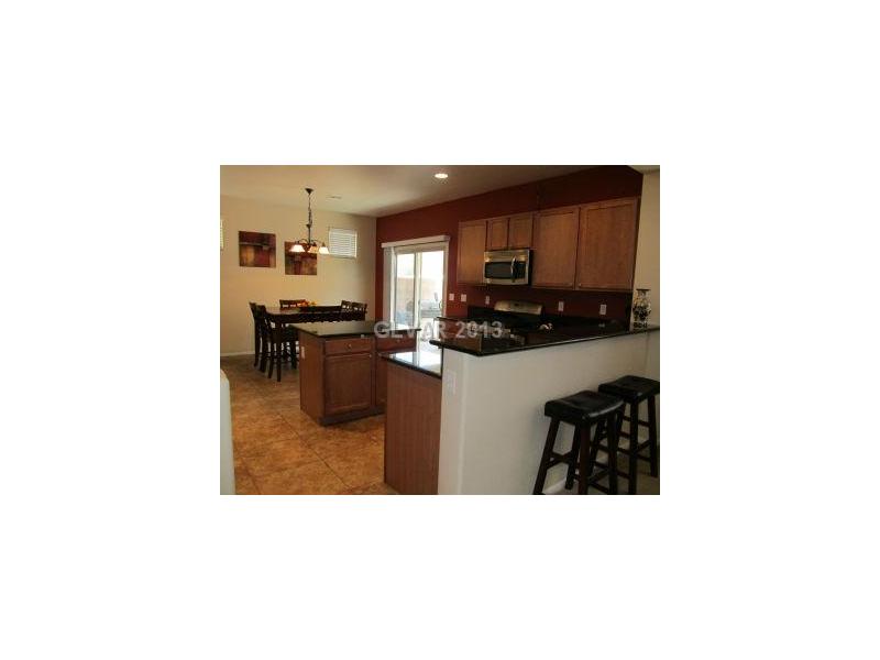 10594 Cave Ridge Street Las Vegas, NV 89179 - Photo 9 of 21 Kitchen.