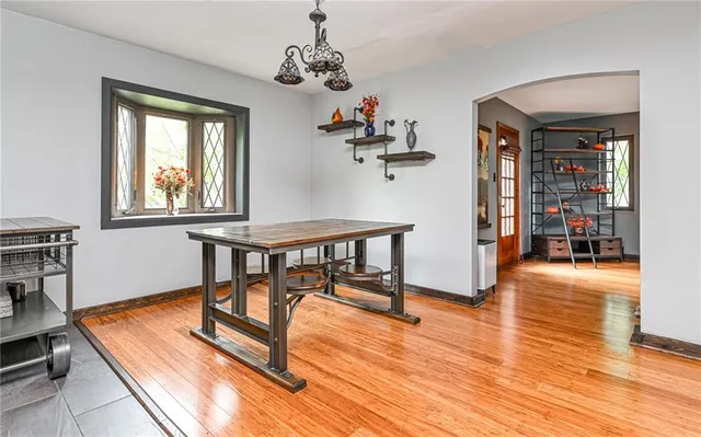 a view of a room with furniture window and wooden floor