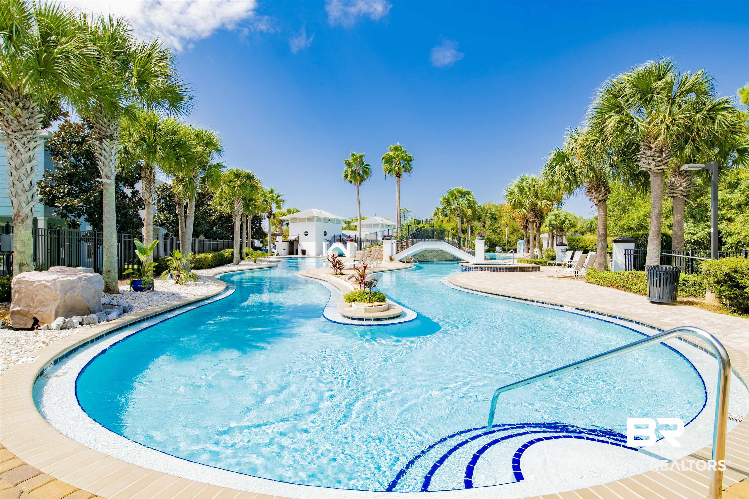 23893 Cypress Crossing Orange Beach, AL 36561 - Photo 17 of 22 Community pool with a patio area
