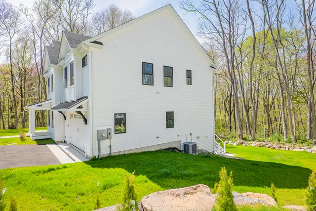 a view of backyard with a garden and plants