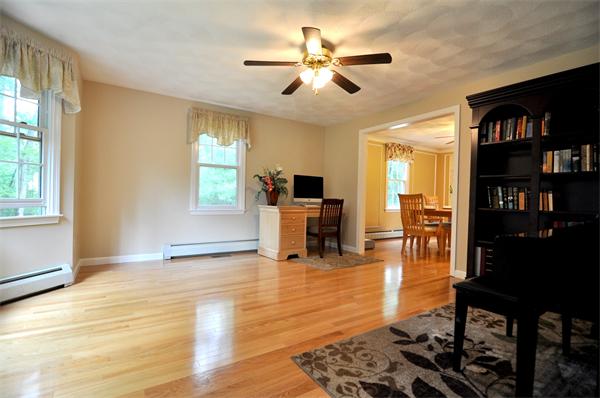 81 R Tenney Road Westford, MA 01886 - Photo 4 of 18 a living room with furniture and wooden floor