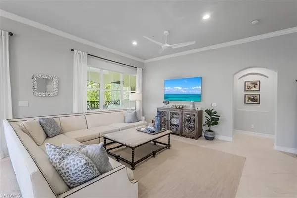 a living room with furniture and window