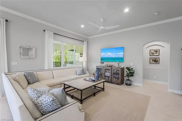 a living room with furniture and window